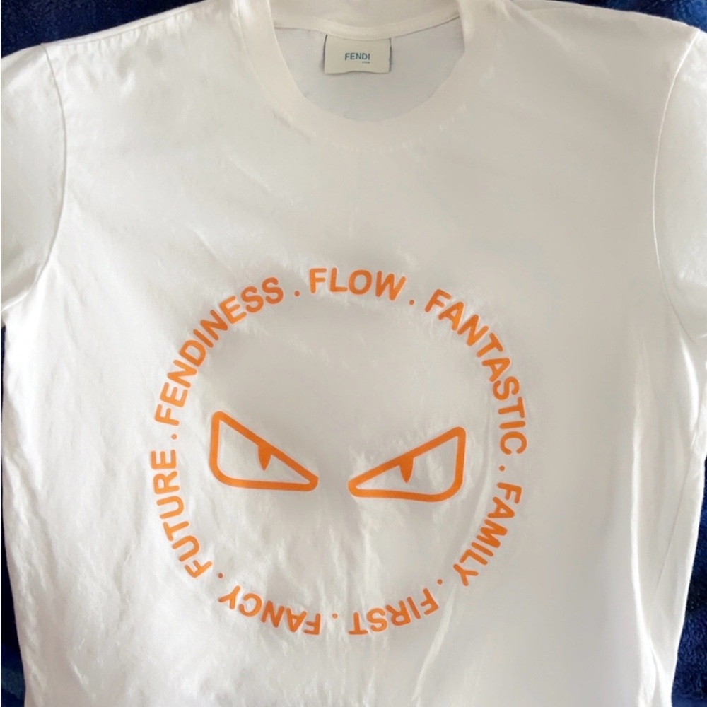 White T-Shirt with Orange Graphic